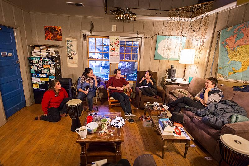 Students lounging in the Outdoor Environment Club house.